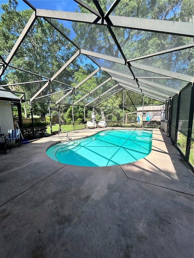 2070 SE 50th Ter, Ocala, FL 34480 - swimming pool with a patio area