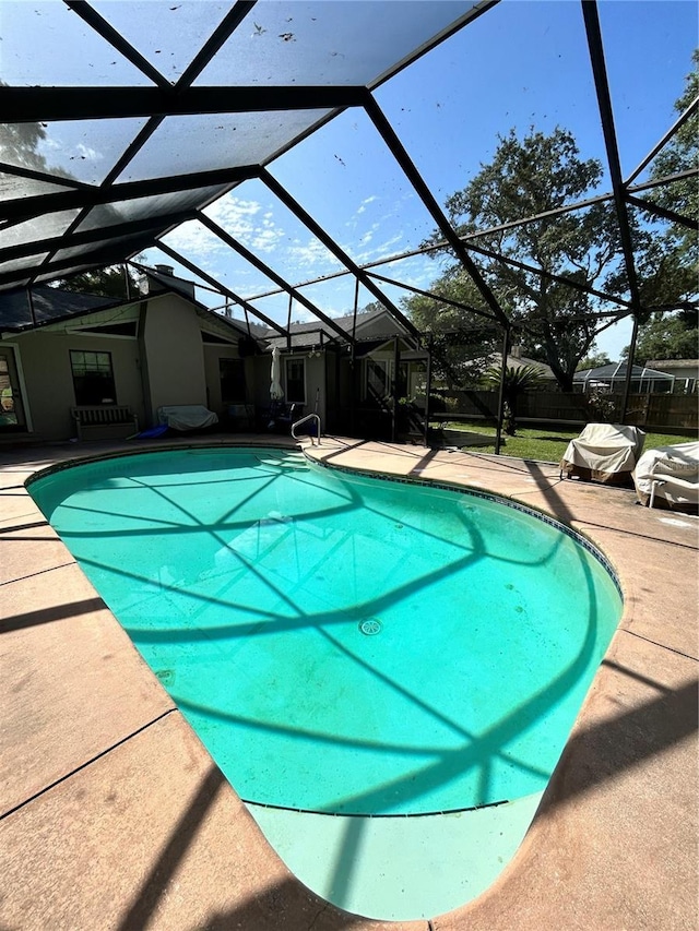 2070 SE 50th Ter, Ocala, FL 34480 - swimming pool with a patio and a lanai