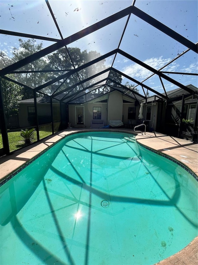 2070 SE 50th Ter, Ocala, FL 34480 - outdoor pool with a patio and a lanai