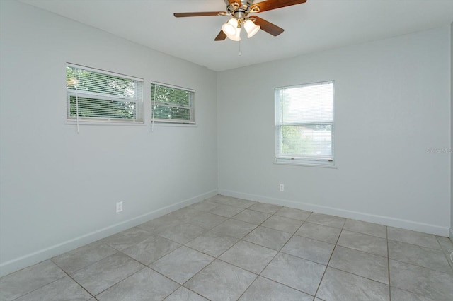 956 Osceola Trl, Casselberry, FL 32707 - empty room featuring a ceiling fan and light tile patterned floors