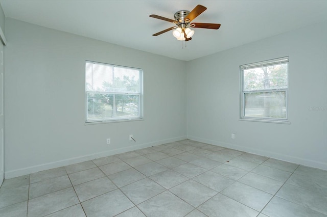 956 Osceola Trl, Casselberry, FL 32707 - spare room with ceiling fan and light tile patterned floors
