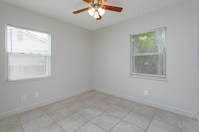 956 Osceola Trl, Casselberry, FL 32707 - empty room featuring a ceiling fan and light tile patterned floors