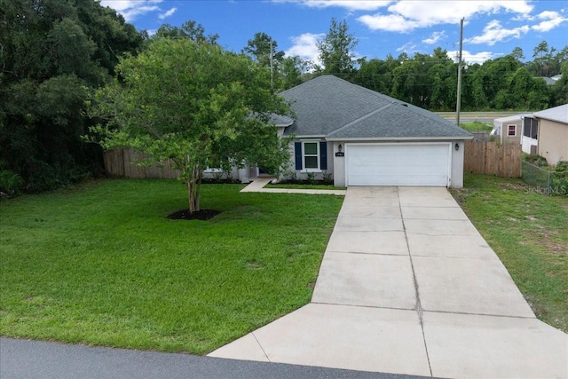 3946 SW 133rd Loop, Ocala, FL 34473 - view of front facade featuring a garage, concrete driveway, a shingled roof, and stucco siding