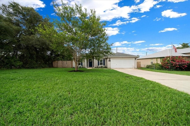 3946 SW 133rd Loop, Ocala, FL 34473 - view of front of home featuring driveway, an attached garage, and stucco siding