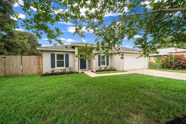 3946 SW 133rd Loop, Ocala, FL 34473 - single story home with stucco siding, a garage, and driveway