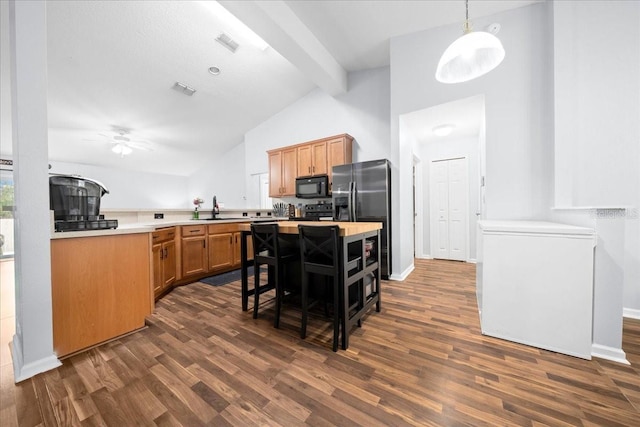 3946 SW 133rd Loop, Ocala, FL 34473 - kitchen featuring black microwave, stainless steel refrigerator with ice dispenser, dark wood-style flooring, and a ceiling fan