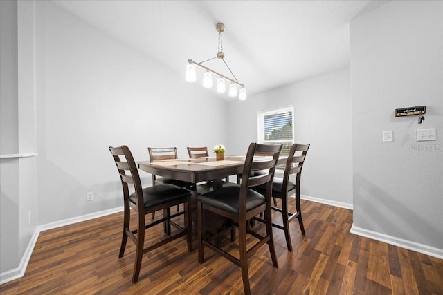 3946 SW 133rd Loop, Ocala, FL 34473 - dining room featuring dark wood-style flooring and baseboards