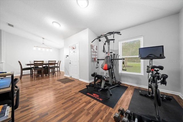 3946 SW 133rd Loop, Ocala, FL 34473 - exercise room with wood finished floors and baseboards