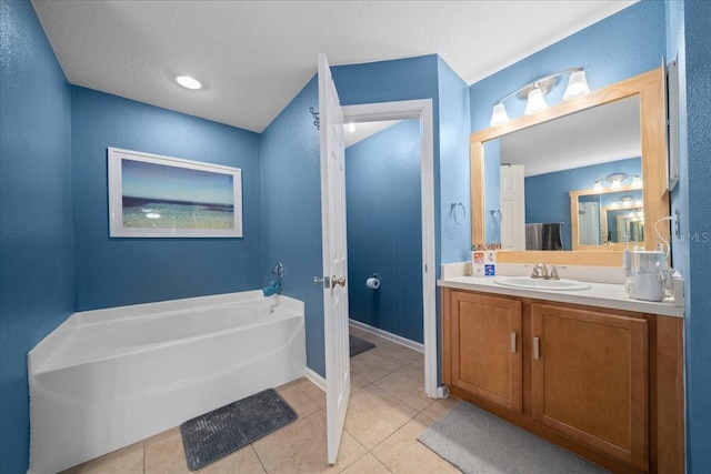 3946 SW 133rd Loop, Ocala, FL 34473 - full bath featuring a bath, tile patterned floors, vanity, and a textured ceiling