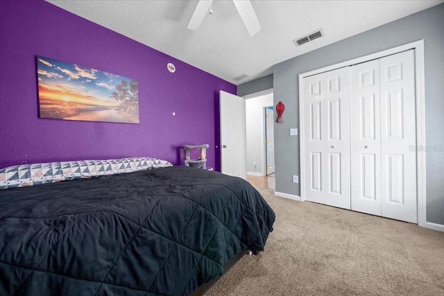 3946 SW 133rd Loop, Ocala, FL 34473 - bedroom featuring carpet floors, ceiling fan, and a closet