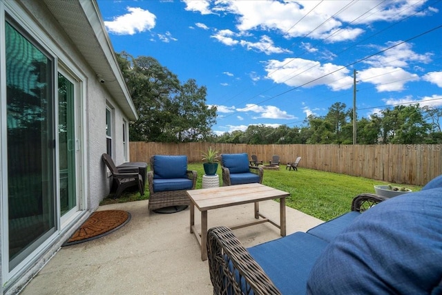 3946 SW 133rd Loop, Ocala, FL 34473 - fenced backyard featuring a patio area