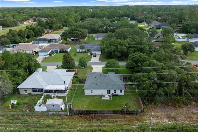 3946 SW 133rd Loop, Ocala, FL 34473 - aerial view of residential area with a forest