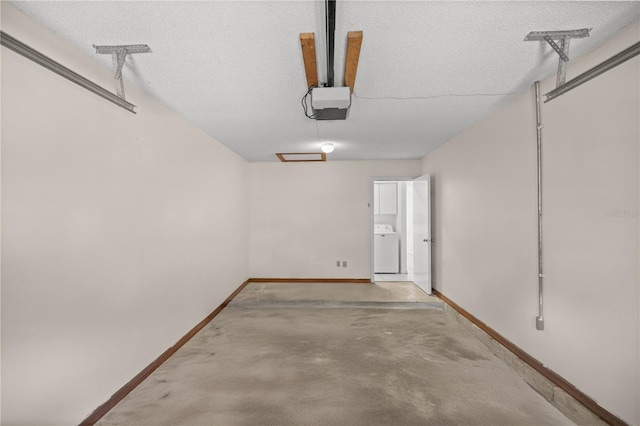 2701 NE 10th St Unit 403, Ocala, FL 34470 - garage featuring washer / dryer and a garage door opener