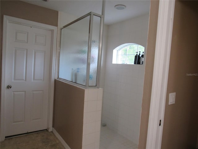 2640 SW 154th Place Rd, Ocala, FL 34473 - bathroom with walk in shower and tile patterned flooring