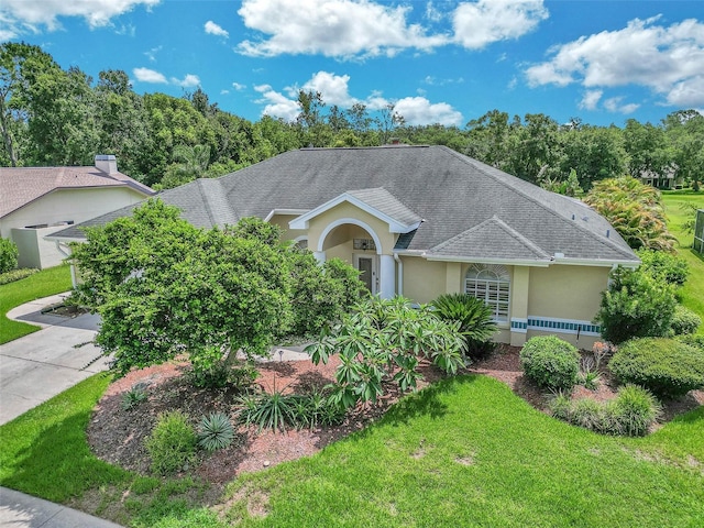 5210 Camberlea Ave, Zephyrhills, FL 33541 - single story home featuring stucco siding, a front yard, and a shingled roof