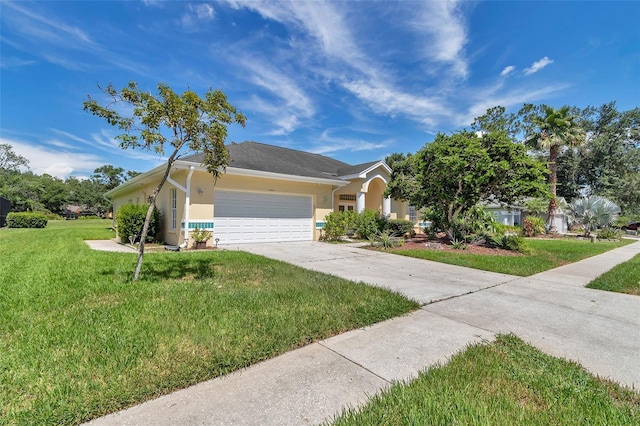 5210 Camberlea Ave, Zephyrhills, FL 33541 - single story home with stucco siding, a garage, a front yard, and concrete driveway