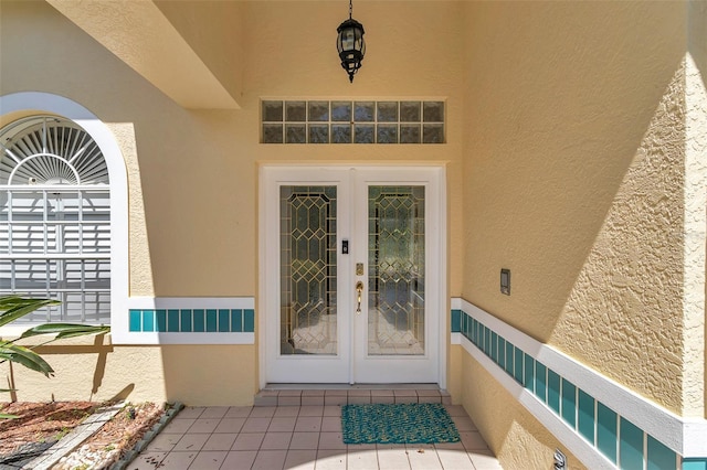 5210 Camberlea Ave, Zephyrhills, FL 33541 - property entrance featuring stucco siding and french doors