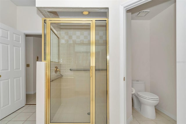 5210 Camberlea Ave, Zephyrhills, FL 33541 - bathroom featuring tile patterned floors and a shower stall