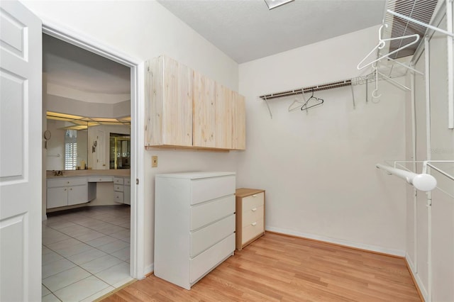 5210 Camberlea Ave, Zephyrhills, FL 33541 - spacious closet featuring light wood-style flooring