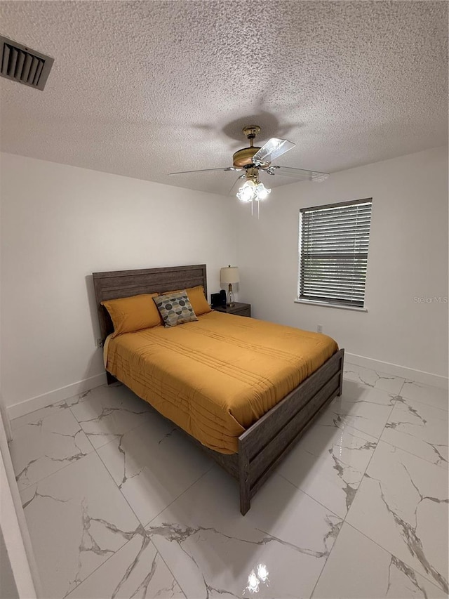 3585 N Hiawatha Ter, Crystal River, FL 34428 - bedroom featuring marble finish flooring and a ceiling fan