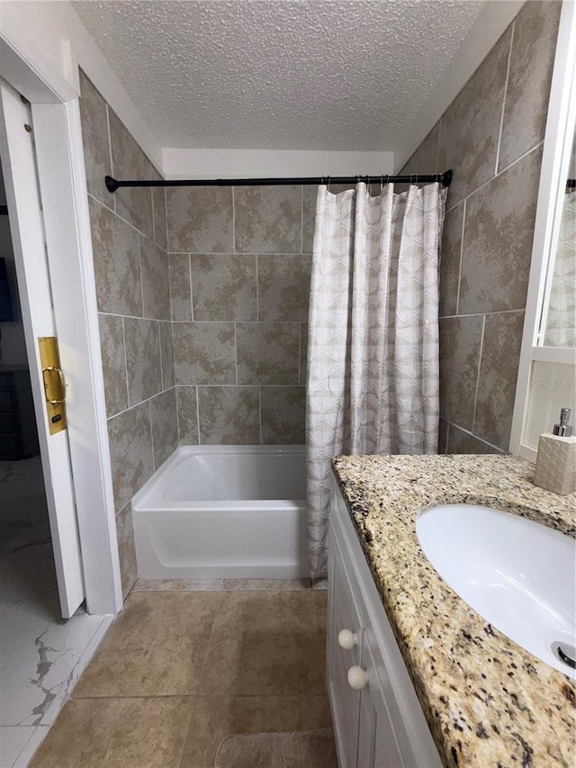 3585 N Hiawatha Ter, Crystal River, FL 34428 - full bathroom featuring tile walls, a textured ceiling, shower / tub combo, and vanity