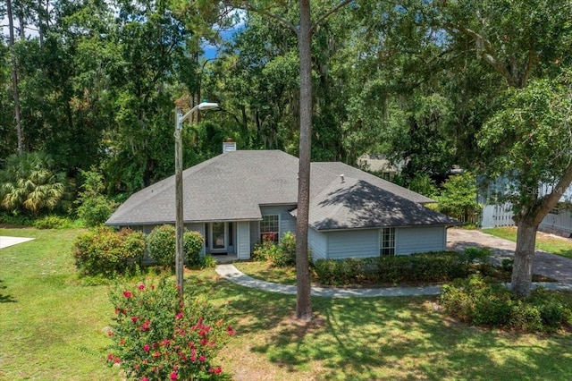 3520 NW 46th Ter, Gainesville, FL 32606 - single story home featuring a chimney and a shingled roof