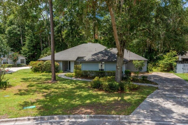 3520 NW 46th Ter, Gainesville, FL 32606 - ranch-style home with driveway