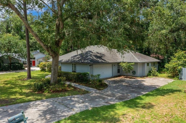 3520 NW 46th Ter, Gainesville, FL 32606 - single story home featuring an attached garage, asphalt driveway, and a front yard