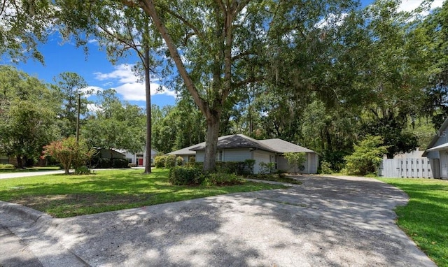 3520 NW 46th Ter, Gainesville, FL 32606 - view of front facade featuring asphalt driveway