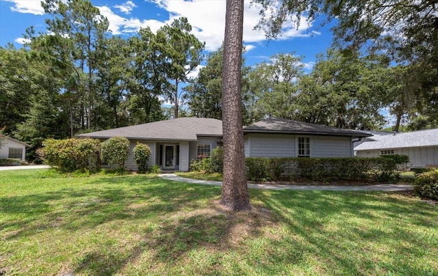 3520 NW 46th Ter, Gainesville, FL 32606 - ranch-style house featuring a front lawn