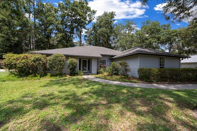 3520 NW 46th Ter, Gainesville, FL 32606 - ranch-style home featuring a front yard