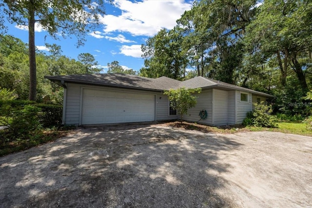 3520 NW 46th Ter, Gainesville, FL 32606 - view of front of home with asphalt driveway and an attached garage