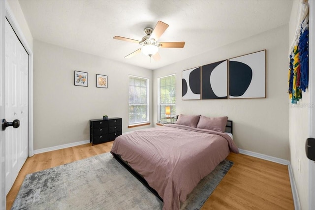 3520 NW 46th Ter, Gainesville, FL 32606 - bedroom featuring wood finished floors, a closet, and ceiling fan