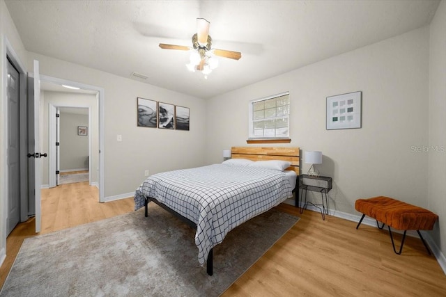 3520 NW 46th Ter, Gainesville, FL 32606 - bedroom featuring light wood-type flooring and a ceiling fan