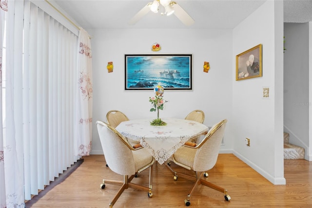 6 Emerald Crse, Ocala, FL 34472 - dining room with light wood-type flooring and a ceiling fan