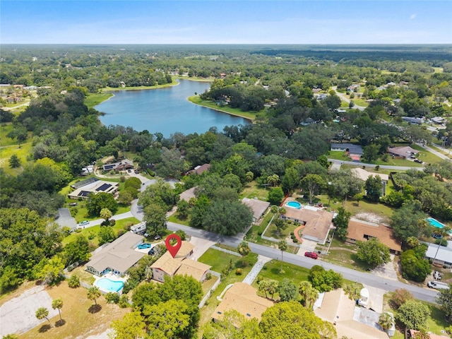 6 Emerald Crse, Ocala, FL 34472 - aerial view of residential area featuring a nearby body of water and a pool