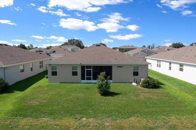 5833 SW 85th Pl, Ocala, FL 34476 - rear view of property with a lawn and stucco siding