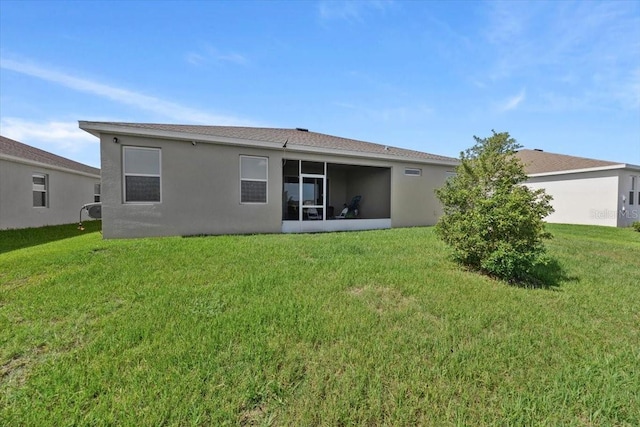 5833 SW 85th Pl, Ocala, FL 34476 - rear view of property featuring a lawn and stucco siding