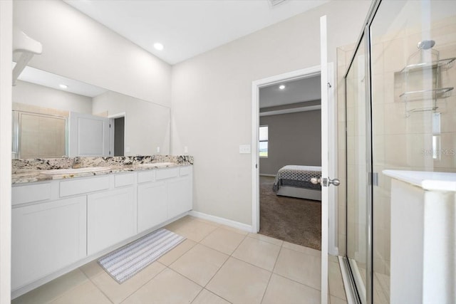 5833 SW 85th Pl, Ocala, FL 34476 - bathroom with ensuite bath, double vanity, a shower stall, tile patterned flooring, and recessed lighting