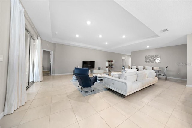 5833 SW 85th Pl, Ocala, FL 34476 - living area with a tray ceiling, light tile patterned floors, and recessed lighting