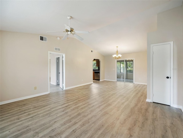 17 Pecan Run Hbr, Ocala, FL 34472 - unfurnished living room featuring a ceiling fan, a chandelier, light wood-style flooring, lofted ceiling, and arched walkways