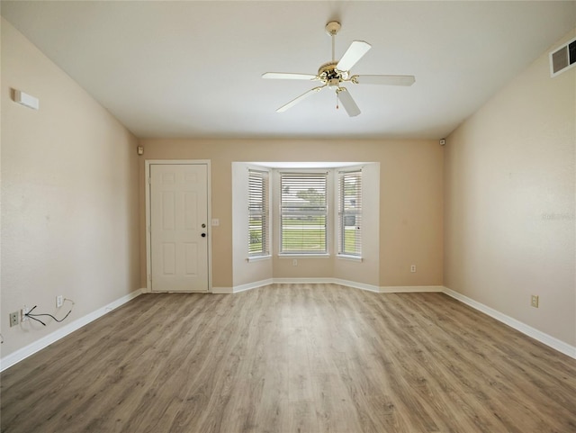 17 Pecan Run Hbr, Ocala, FL 34472 - unfurnished room with light wood finished floors and ceiling fan