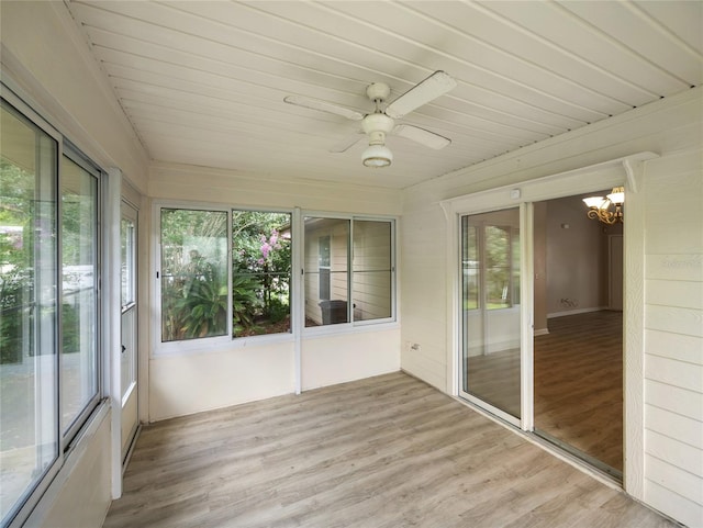 17 Pecan Run Hbr, Ocala, FL 34472 - unfurnished sunroom with a ceiling fan, wood finished floors, a chandelier, and wood ceiling
