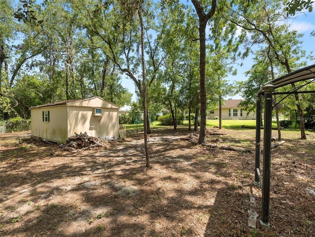 17 Pecan Run Hbr, Ocala, FL 34472 - view of yard with an outbuilding