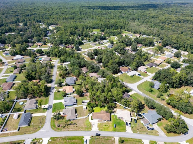 17 Pecan Run Hbr, Ocala, FL 34472 - aerial overview of property's location featuring a heavily wooded area and nearby suburban area