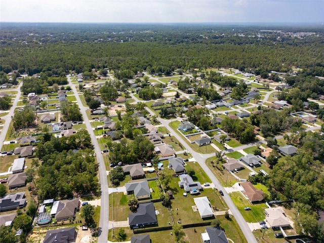 17 Pecan Run Hbr, Ocala, FL 34472 - view of property location featuring a heavily wooded area and nearby suburban area