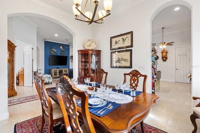 5233 Fountain Walk, Lady Lake, FL 32159 - dining room featuring arched walkways, ornamental molding, a chandelier, light tile patterned floors, and ceiling fan