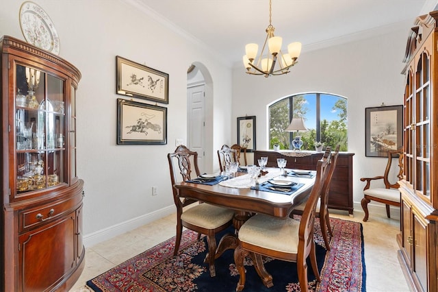 5233 Fountain Walk, Lady Lake, FL 32159 - dining space featuring a chandelier, arched walkways, and crown molding