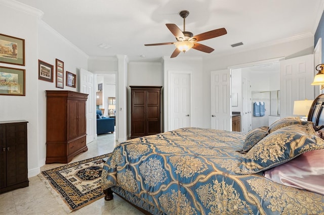 5233 Fountain Walk, Lady Lake, FL 32159 - bedroom with crown molding, ceiling fan, and ensuite bath