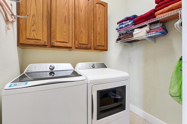 5233 Fountain Walk, Lady Lake, FL 32159 - laundry area with washing machine and clothes dryer and cabinet space